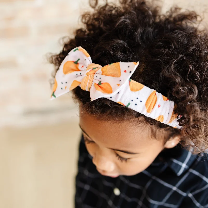 PRINTED TIED HARD HEADBAND: pumpkin